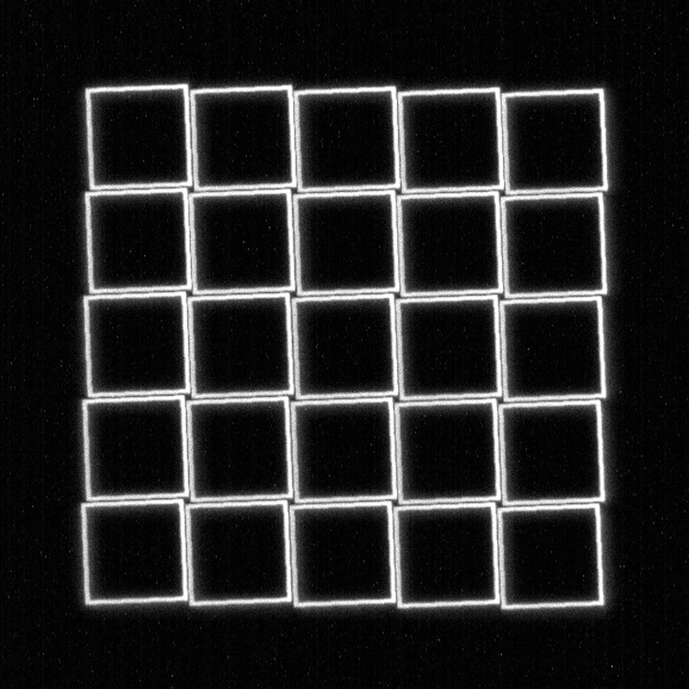Stacked field grid before calibration: tilted squares with uneven gaps